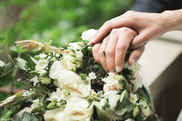 Wonderful luxury wedding bouquet of different flowers - Фото, зображення
