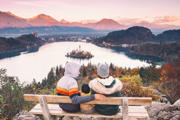 Traveling family looking on Bled Lake, Slovenia, Europe  - Foto, afbeelding