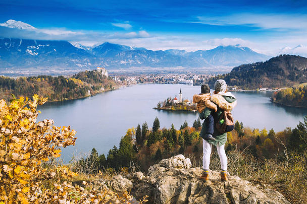 Traveling family looking on Bled Lake, Slovenia, Europe  - Foto, imagen