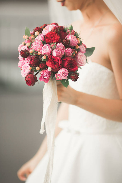 Beautiful luxury wedding bouquet of red flowers - Фото, зображення