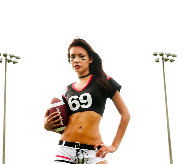 Nainen yllään amerikkalainen jalkapallo top
 - Valokuva, kuva