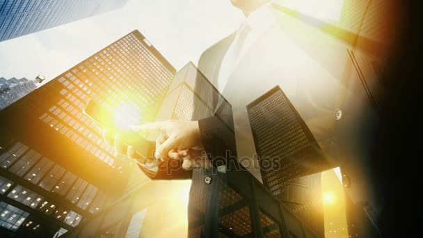 Business center Businessman using digital tablet. Double exposure. - Footage, Video