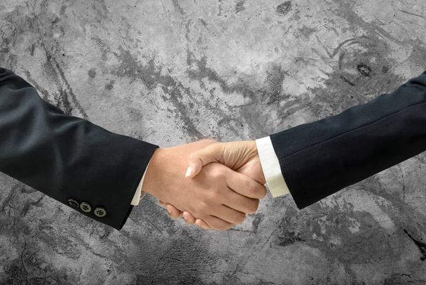 Asia Businessman open hand for handshake to make a deal and blank wall for text and background. Copy Space - Photo, Image