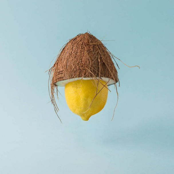Lemon with coconut hat - Фото, изображение