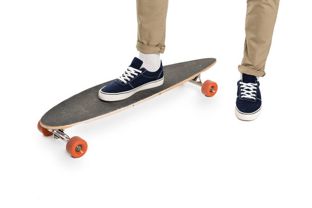 pernas masculinas e longboard
 - Foto, Imagem