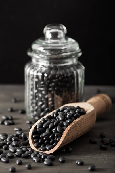 black turtle beans legumes in scoop - Photo, Image