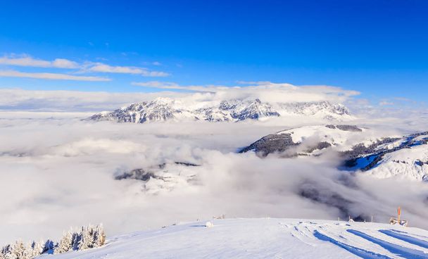 Горы со снегом зимой. Горнолыжный курорт Soll, Тироль, Австрия
 - Фото, изображение