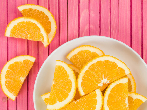 Freshly Cut Juicy Orange Slices or Segments - Valokuva, kuva