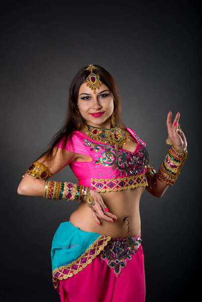 Indian girl in a dance pose - Photo, Image