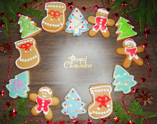 christmas cookies gingerbread and decoration on wooden backgroun - Photo, Image