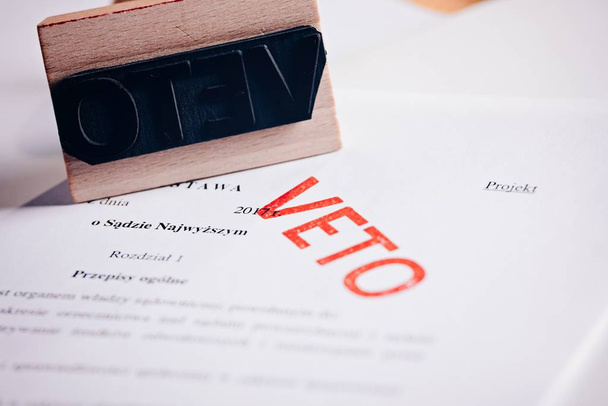Polish law act with red veto stamp. - Photo, Image