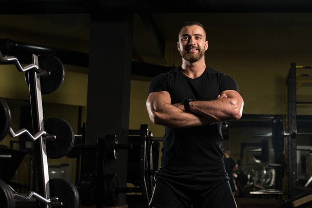 Portrait Of A Muscular Man In Black Shirt - Foto, Imagem
