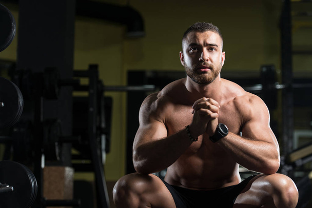 Muscular Man After Exercise Resting In Gym - Fotografie, Obrázek
