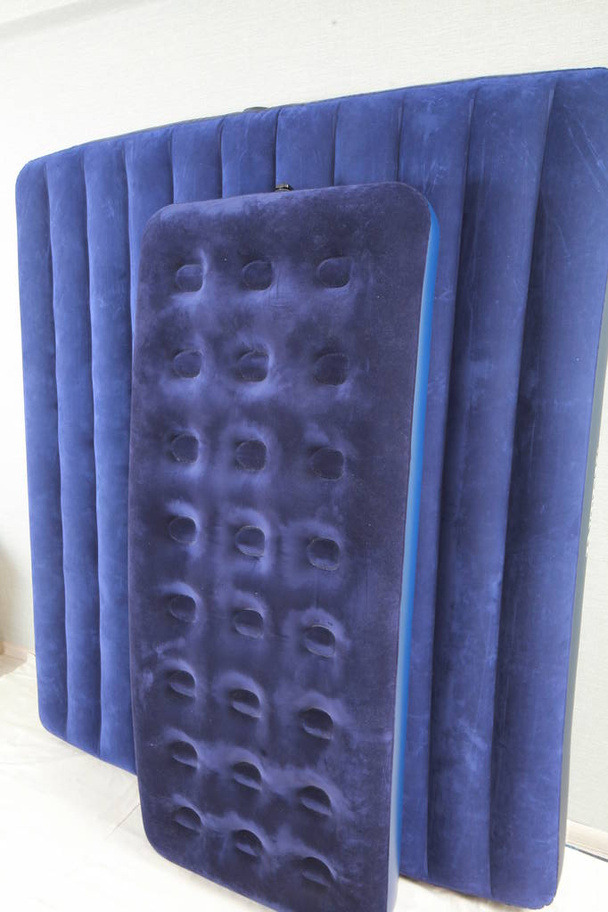 Blue inflatable mattress for sleeping and resting - Photo, Image