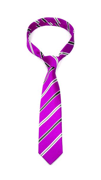 κομψό δεμένη βυσσινί ριγέ γραβάτα απομονώνεται σε λευκό φόντο - Φωτογραφία, εικόνα