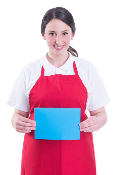 Friendly seller holding blank paper in hands - Photo, Image