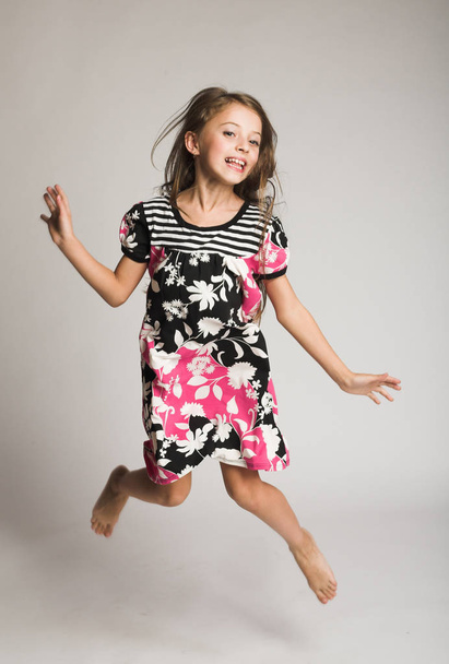 girl jumping of joy - Φωτογραφία, εικόνα