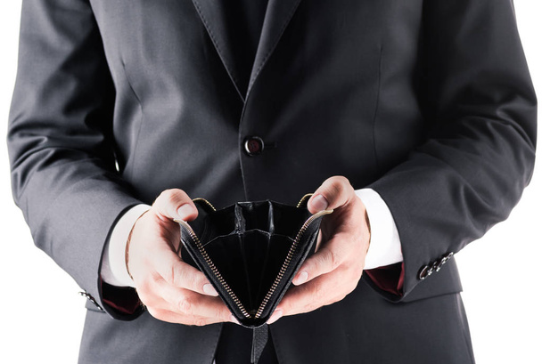 businessman holding empty wallet   - Fotó, kép