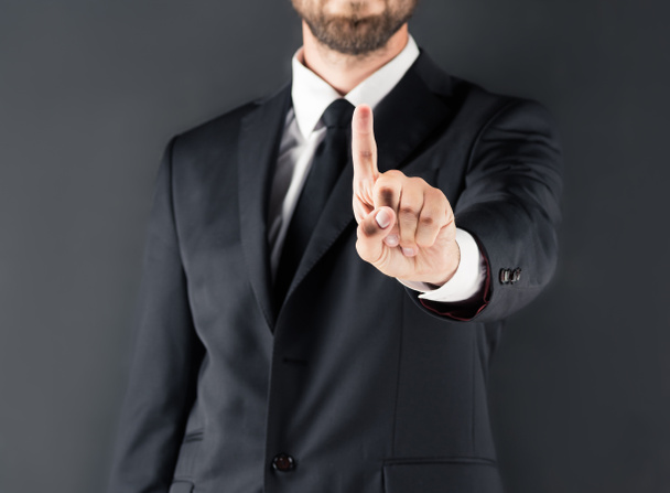businessman pointing with finger  - Фото, зображення