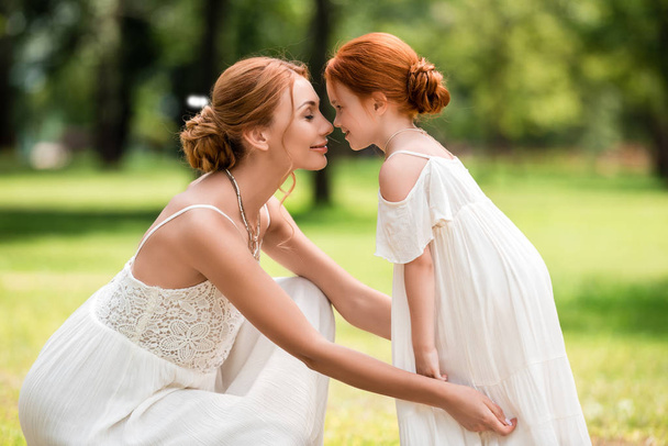 beautiful happy mother and daughter  - Photo, Image