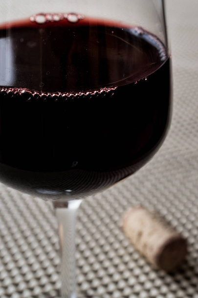 Red wine in a glass. - Photo, image