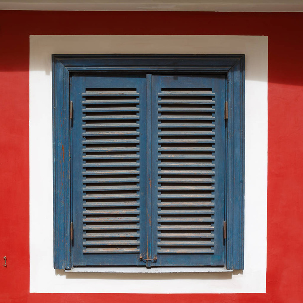 Od window with closed blue shutters - Photo, Image