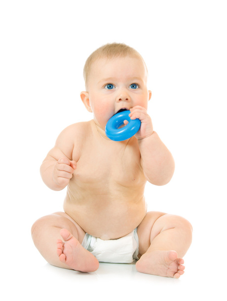 Sitting small baby with a toy - Foto, Imagen
