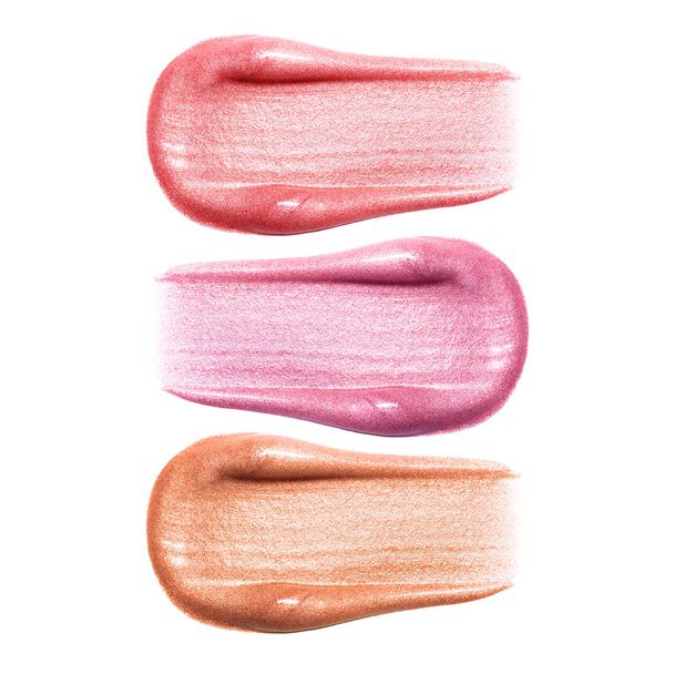 Set of different lip glosses smear samples isolated on white. Smudged makeup product sample. - Photo, Image