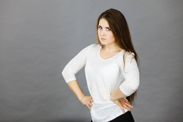 Attractive woman having angry frustrated face expression - Foto, Bild