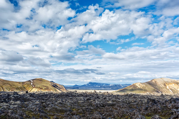 Mountains and lava fields in Landmannalaugar valley in Iceland - Φωτογραφία, εικόνα