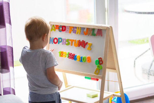 Little boy learning alphabet  - Zdjęcie, obraz