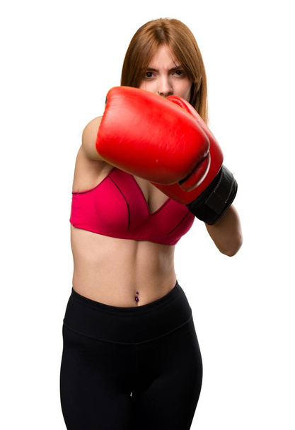 Young sport woman with boxing gloves - Foto, imagen