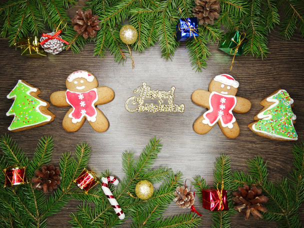 Χριστούγεννα μελόψωμο cookies και διακόσμησης για ξύλινα backgroun - Φωτογραφία, εικόνα