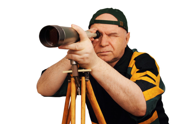 Um homem com um telescópio na mão
 - Foto, Imagem