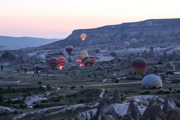 Hot Air Balloons in Cappadocia Valleys - Foto, afbeelding