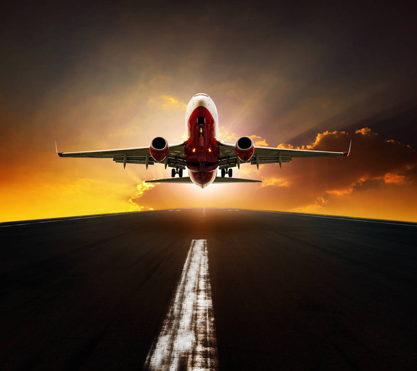 passenger plane take off from airport runway agasint beautiful s - Photo, Image