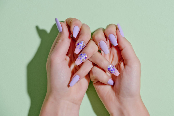 Hands of girl with manicure. - Foto, Bild