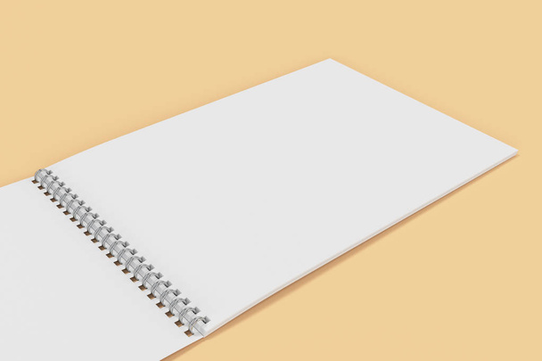 Open blank white notebook with metal spiral bound on orange back - Foto, immagini