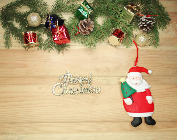 christmas decoration and copy space on wooden background - Photo, Image