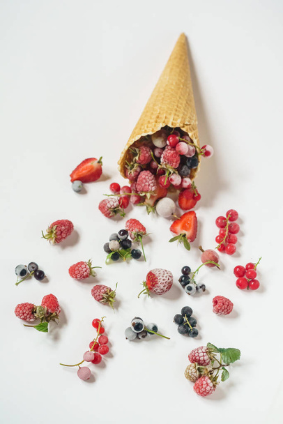 frozen berries in ice cream cone - Photo, Image