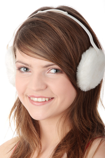 Pretty girl wearing white earmuff - Фото, зображення