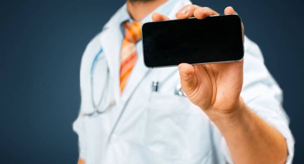 Technology in Health and Medicine Concept. Doctor With Smartphone - Foto, Imagen