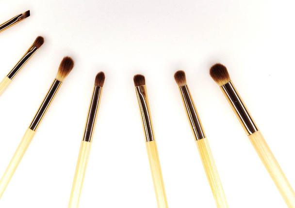 Brushes for makeup bamboo on white for inscription - Photo, Image