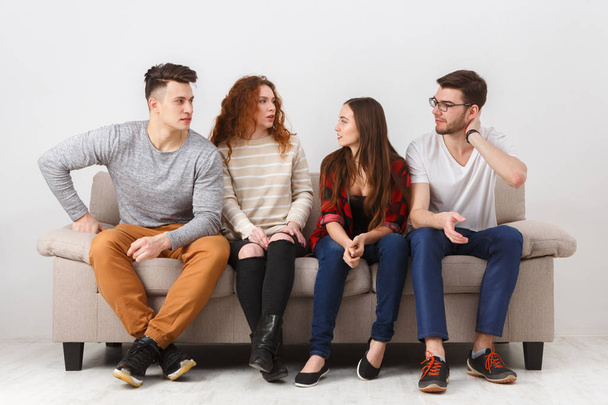 Happy young friends, casual people sitting on couch - Foto, Imagem