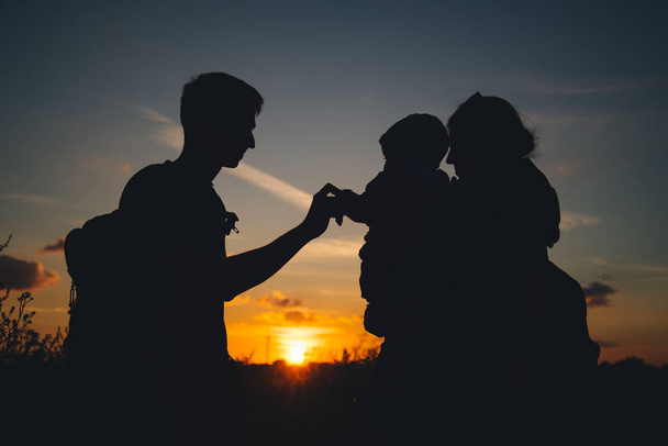 Silhouette, happy children with mother and father - 写真・画像