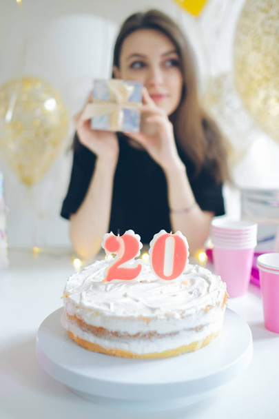 Young woman with cake - Photo, Image