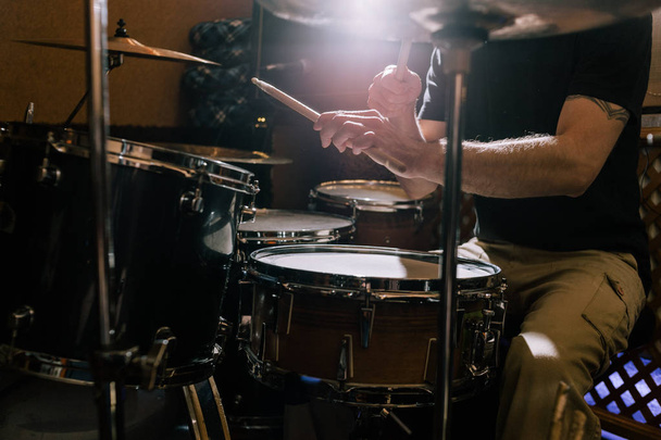 Professional drum set closeup. Musician with drums - Fotografie, Obrázek