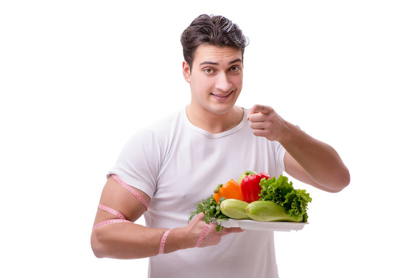Homem no conceito de alimentação saudável
 - Foto, Imagem