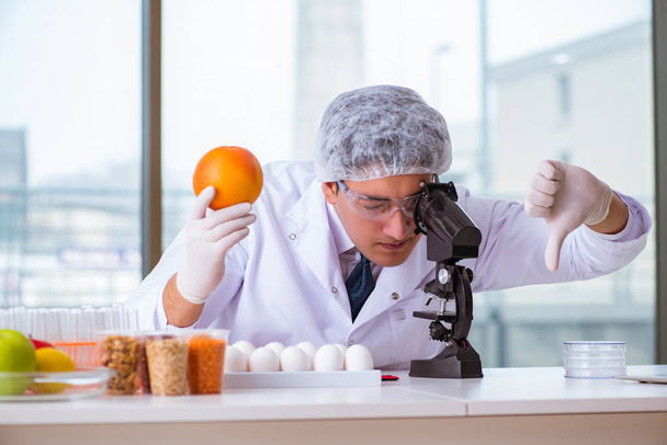 Nutrition expert testing food products in lab - Фото, зображення