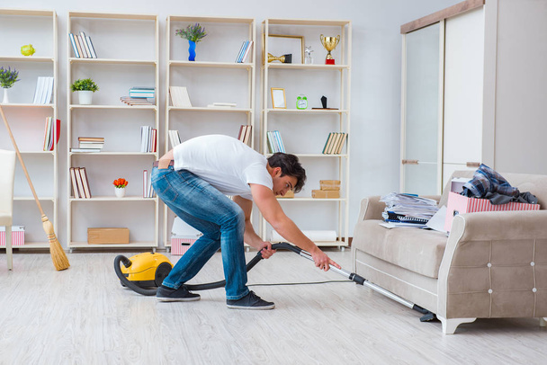 Man doing cleaning at home - Foto, Imagen